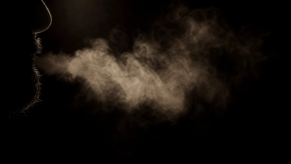 A luminous breath moving through darkness.